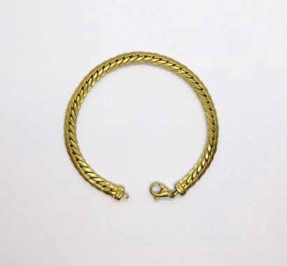 BRACELET in 18K (750/°°) yellow gold. L:...