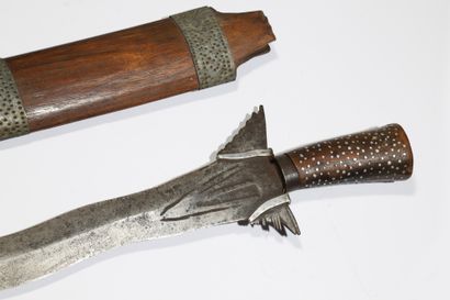 
Long Moro kriss with a sinuous blade. The...