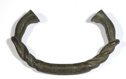 Old torque stylizing a rope. In bronze with...