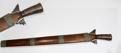 
Long Moro kriss with a sinuous blade. The...