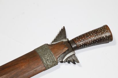 
Long Moro kriss with a sinuous blade. The...