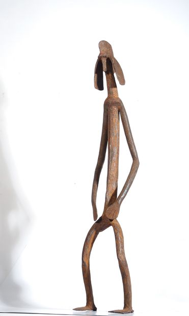 Cult iron presenting an anthropomorphic effigy...