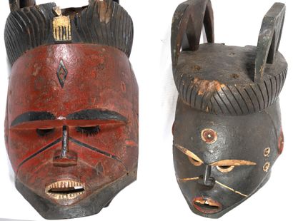 Masque heaume Janus en bois polychrome sculpté....
