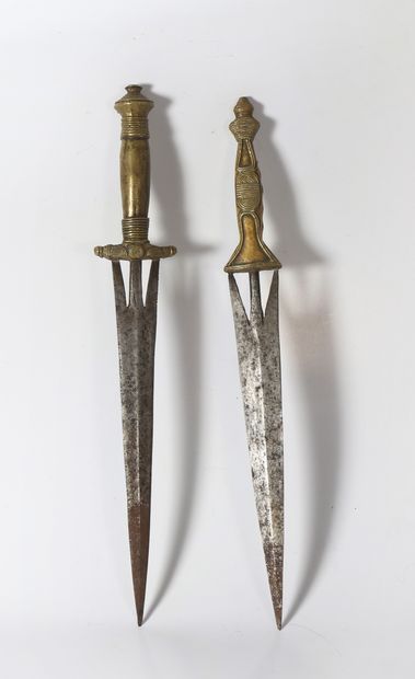 Set of two daggers with straight openwork...