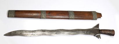 
Long Moro kriss with a sinuous blade. The...
