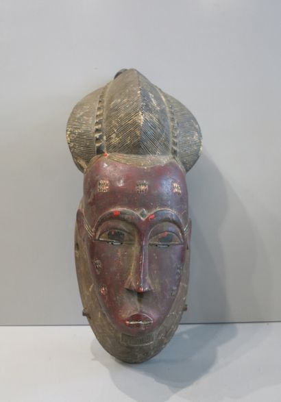 Masque Baoulé à coiffure trilobé.

Bois polychrome.

Côte...