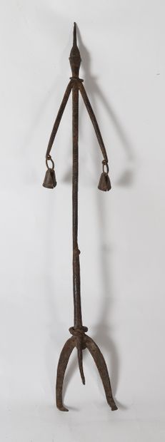 Cult iron with a stylized figure holding...