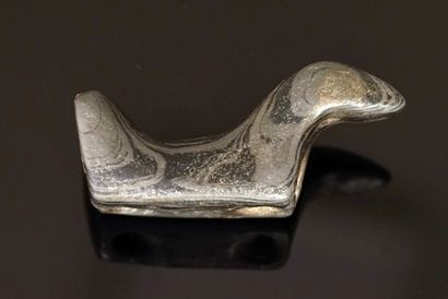 Birdstone in grey-green schist flamed with...
