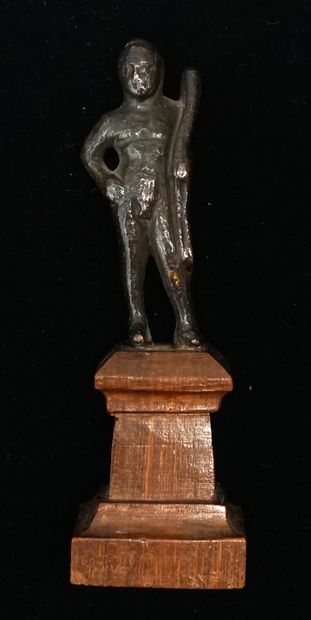 Hercules standing in bronze with brown patina....