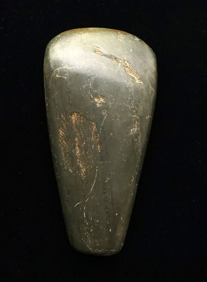 Polished axe in green stone. (a few chips...