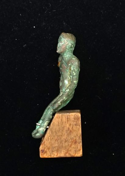 Harpocrates in bronze with green patina....