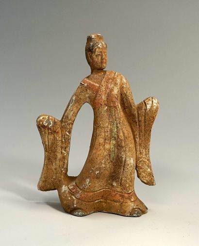 Richly dressed dancer in engobe clay. Tang...