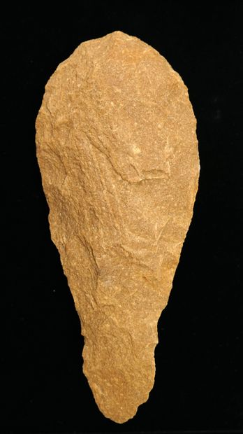 Large beige quartzite biface. Acheulean....