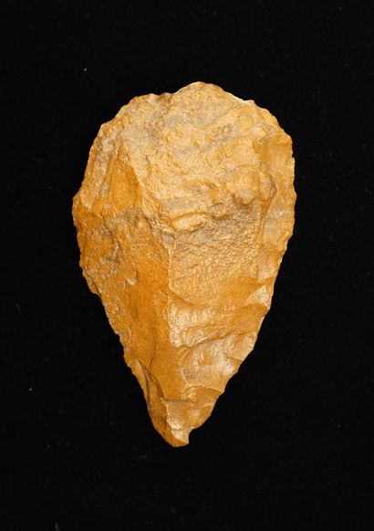 Beautiful amygdaloid biface in caramel stone...