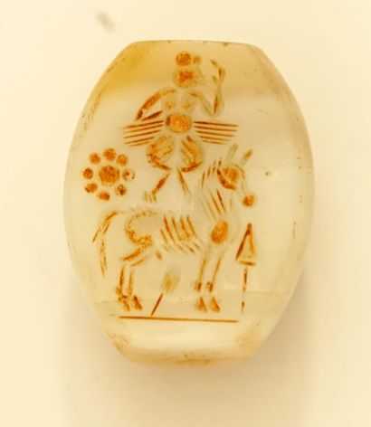 Ovoidal pearl presenting in register a man,...