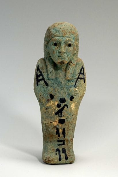 Shaouabti in enamelled green oxidized frit....