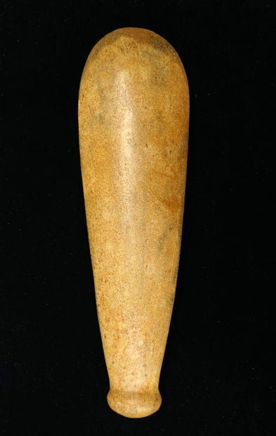 Finely polished button axe in greenish beige...