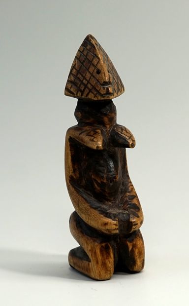Small Dogon fetish with patina of use. Very...