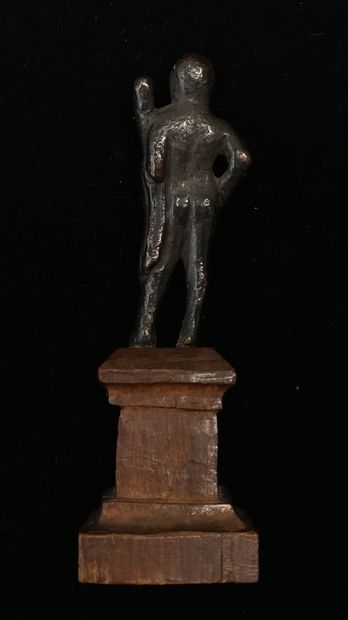 Hercules standing in bronze with brown patina....