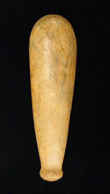 Finely polished button axe in greenish beige...