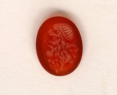 Intaglio showing a profile of an old bearded...
