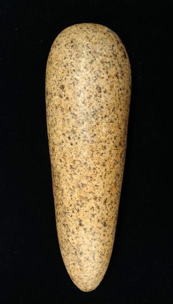 Polished axe in beige speckled stone with...