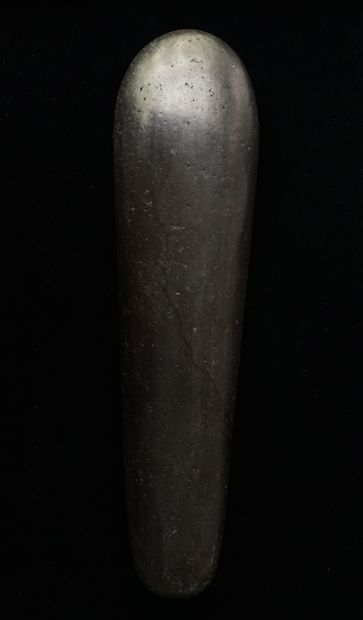 Beautiful polished axe in black stone slightly...
