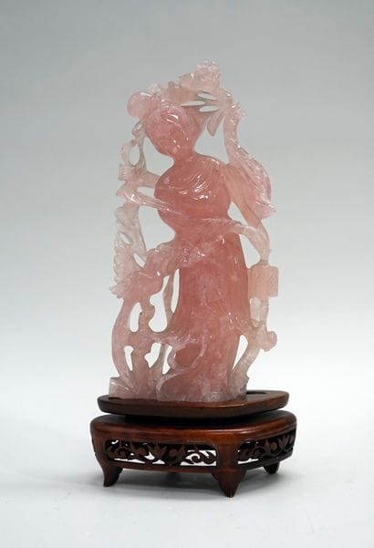 Rose quartz gwanyn holding a lantern and...