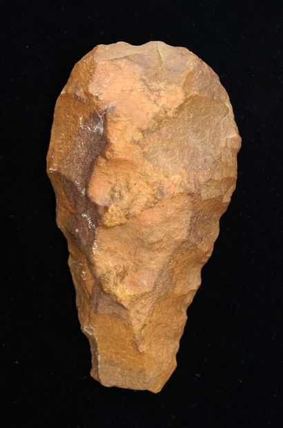 Brown flint biface (blunt point). Acheulean....