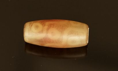 DZI bead decorated with nine eyes. L: 3,...