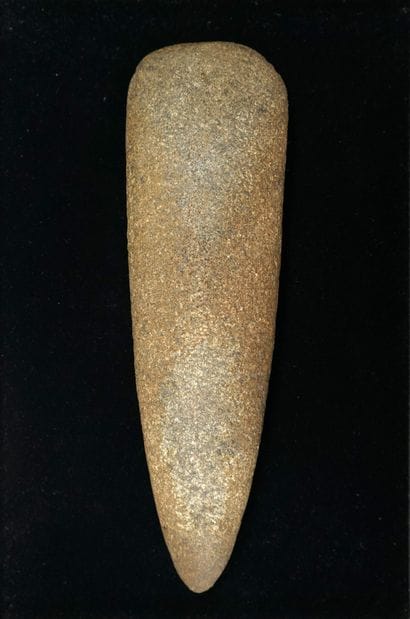 Important polished axe in grey stone with...