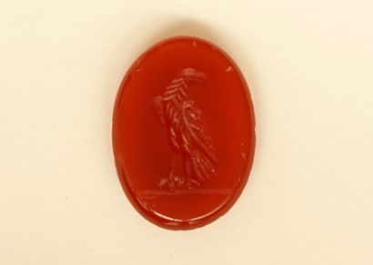 Intaglio showing an eagle with folded wings....