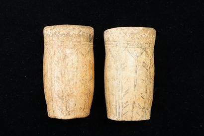 Two terracotta cups decorated with painted...