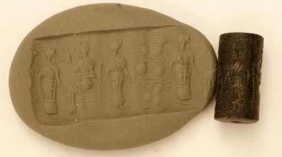 Cylinder seal with a frieze of orants. Black...