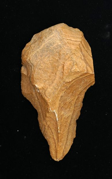 Brown quartzite lanceolate biface. Early...