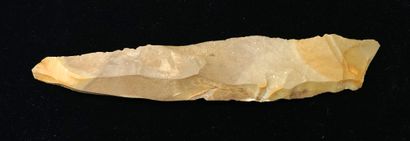 Blond flint blade bearing a label marked...