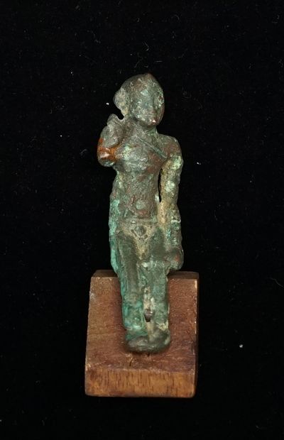 Harpocrates in bronze with green patina....