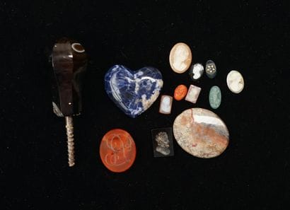 SET composed of cameos and intaglios in various...