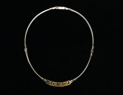 Silver and 18k (750/°°) yellow gold articulated...