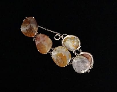 BRACELET articulated composed of plates of...