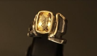 Silver and yellow gold modernist ring with...