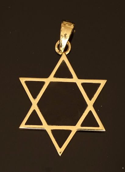 18k (750/°°) yellow gold and onyx pendant...