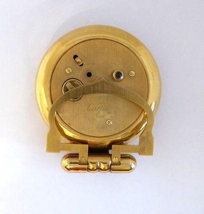 CARTIER - MUST Travel alarm clock. Gilt brass...