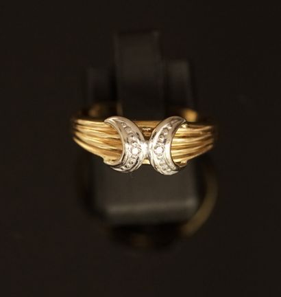 RING in 18k (750/°°) yellow and white gold...