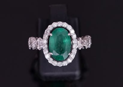 18k (750/°°) white gold ring centered on...