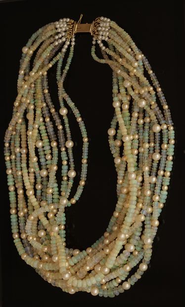 NECKLACE composed of 12 rows of opal pearls...