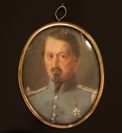 Oval MINIATURE mounted in pendant presenting...