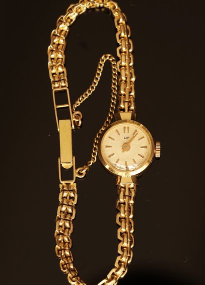 LIP - Lady's wristwatch in 18K (750/°°) yellow...