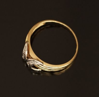 RING in 18k (750/°°) yellow and white gold...