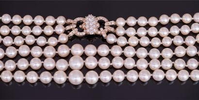 NECKLACE composed of 3 rows of cultured pearls...